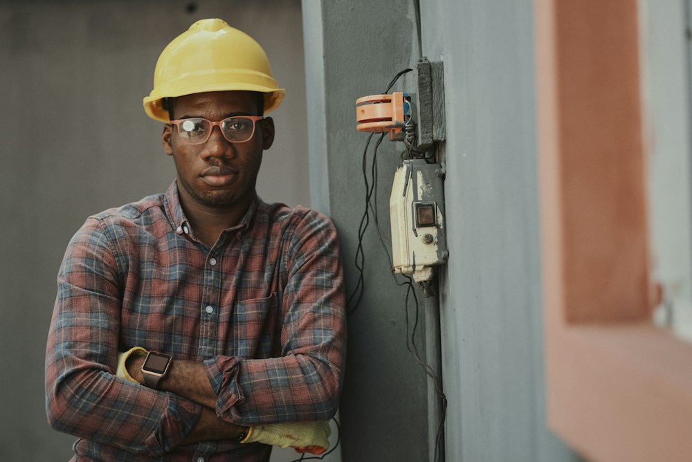 Qualified electrician working on electrical equipment